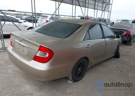2002 Toyota Camry Le from USA, damaged, VIN JTDBE32K220068393